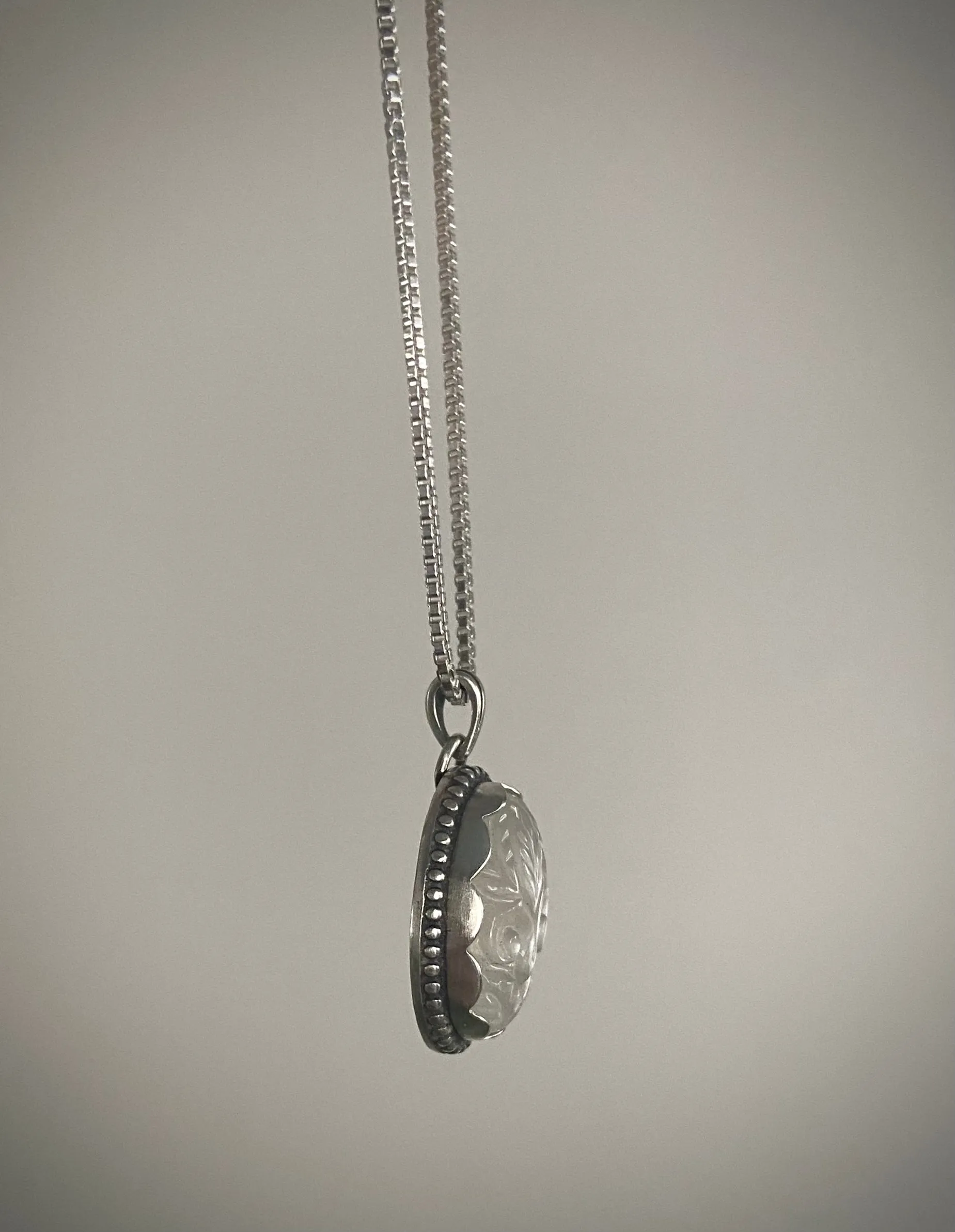 Carved White Moonstone Pendant