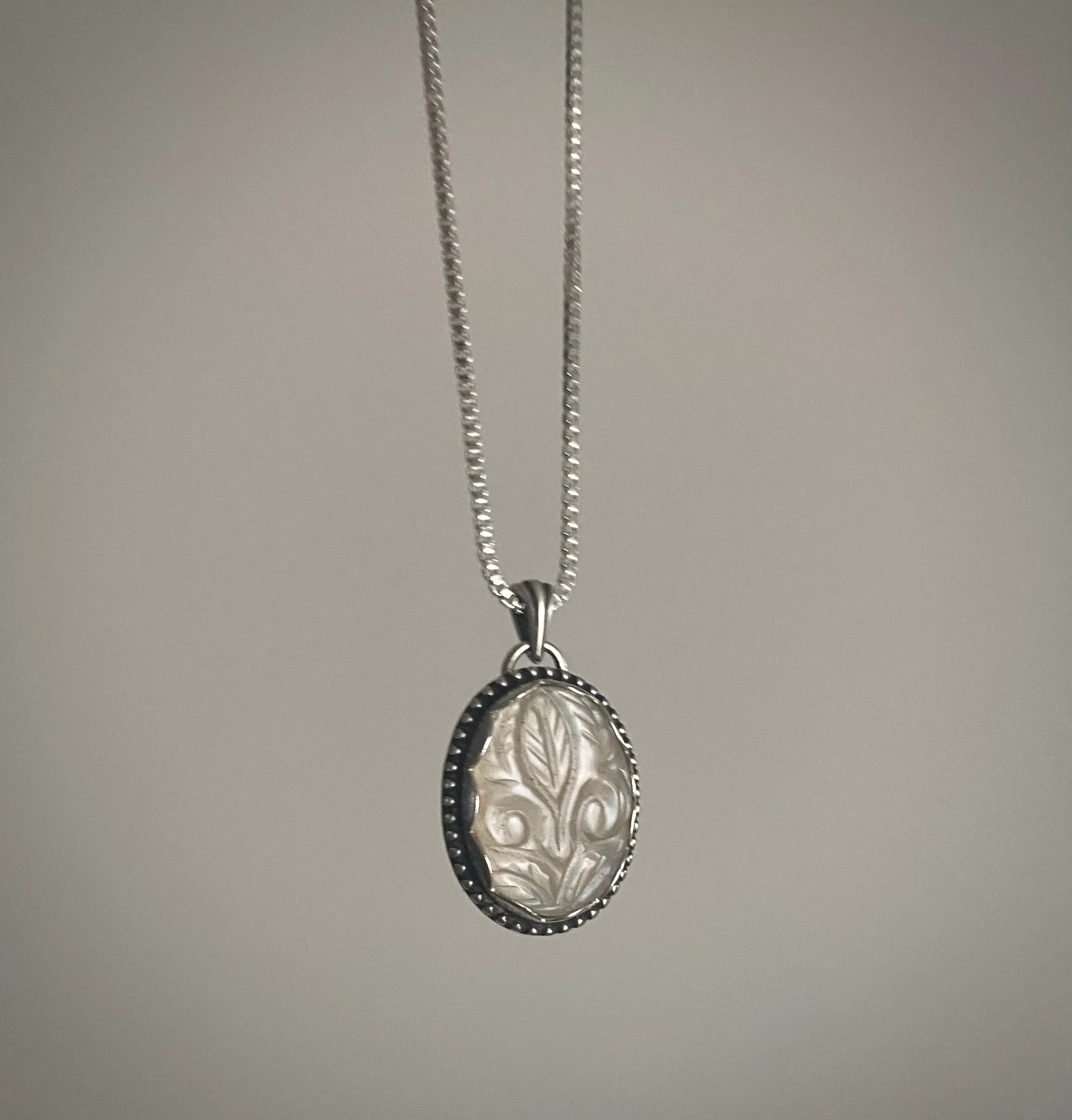 Carved White Moonstone Pendant