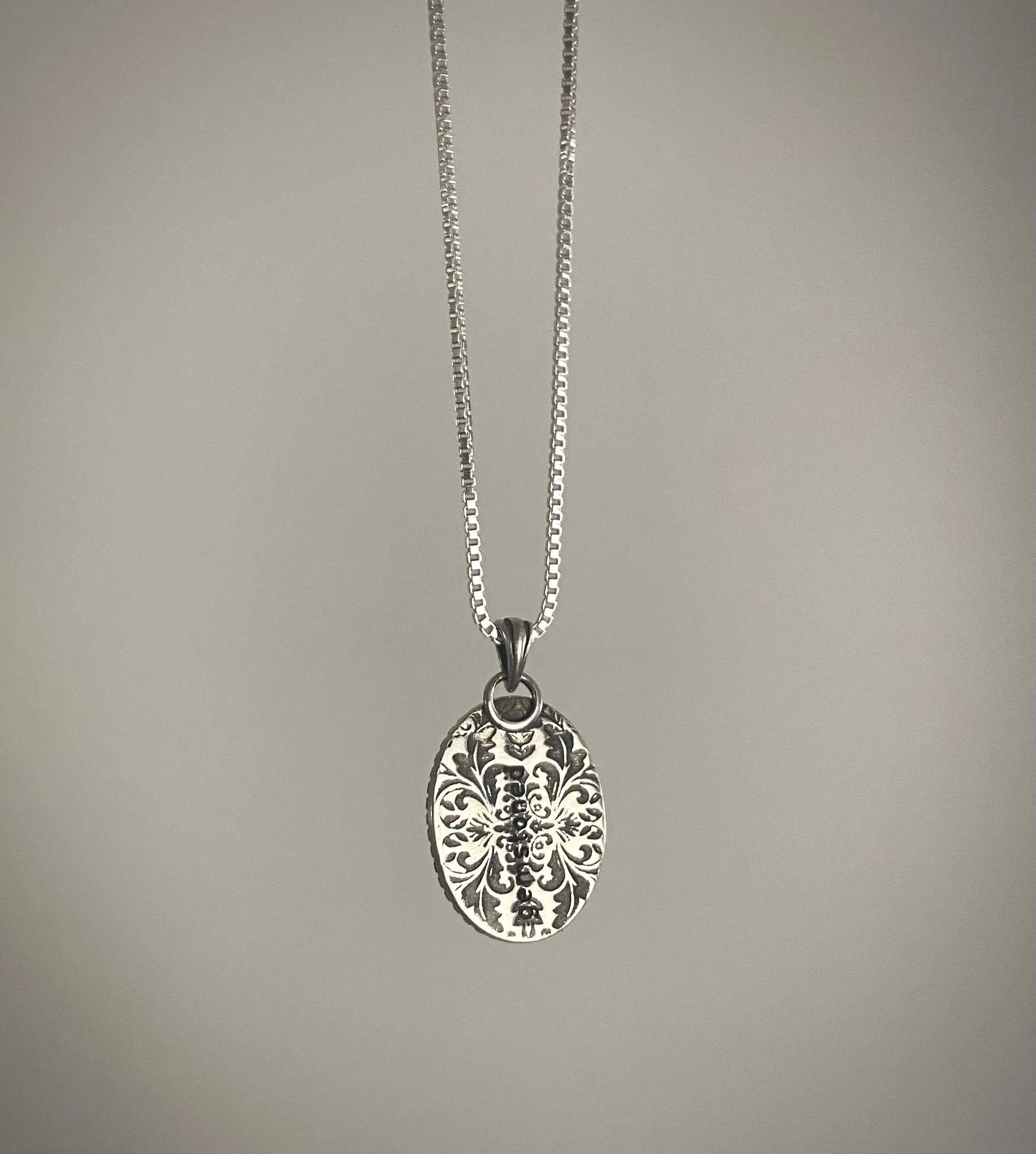 Carved White Moonstone Pendant