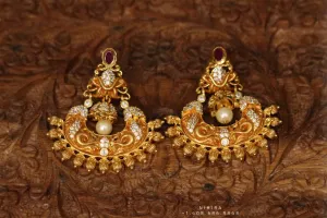 Chandelier earrings ,party wear earrings,designer jewelry,hand picked jewelry,celebrity jewelry,fashion jewelry,fusion jewelry earrings