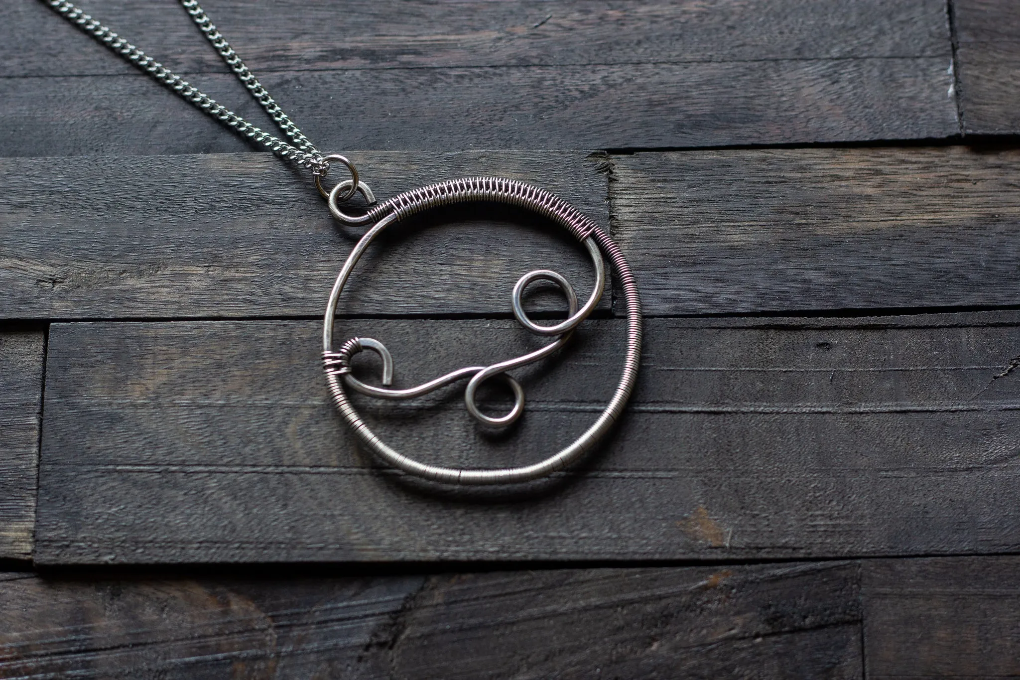 Circular Sterling Silver Wire Wrapped Pendant