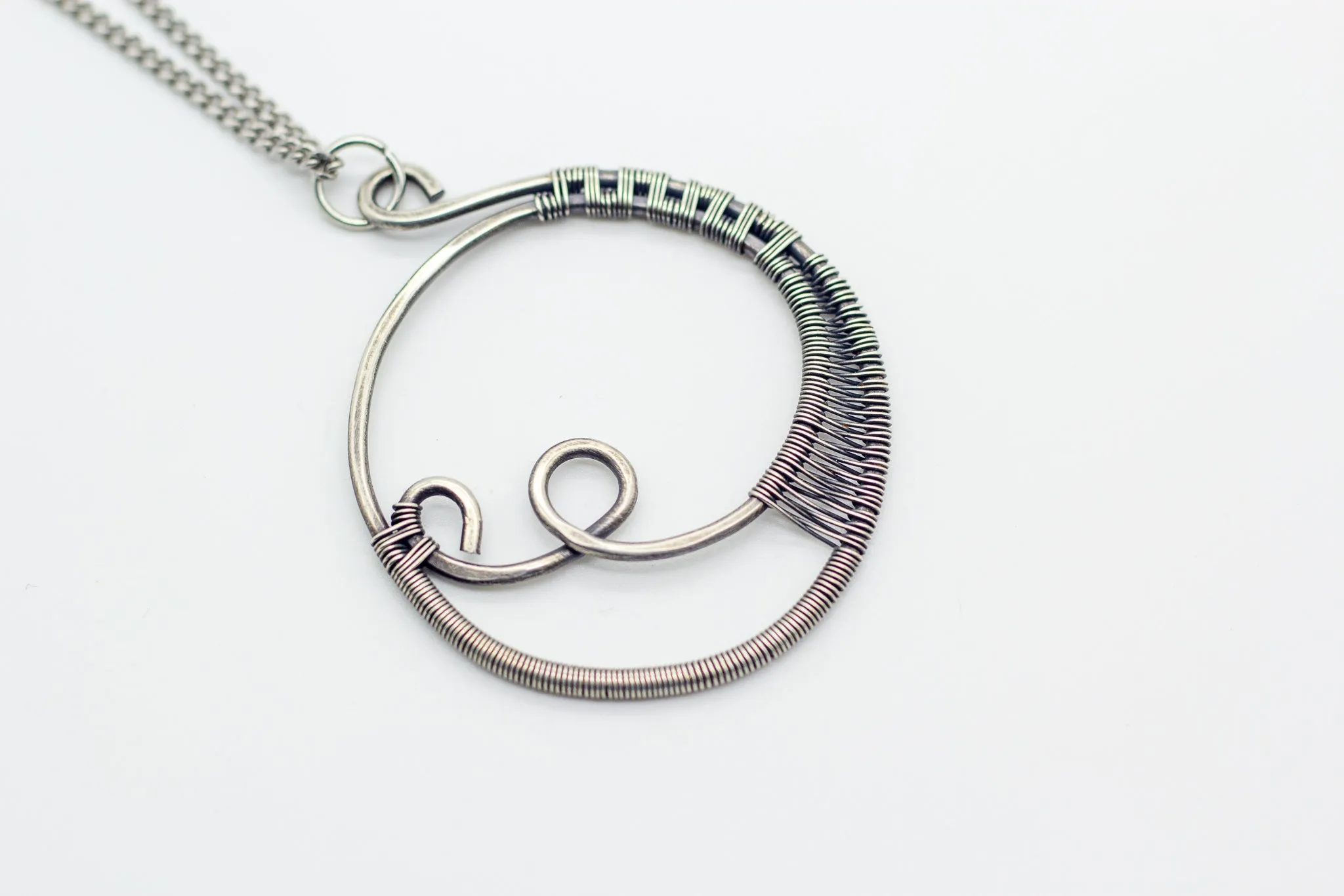 Circular Sterling Silver Wire Wrapped Pendant