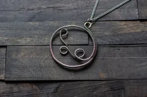 Circular Sterling Silver Wire Wrapped Pendant