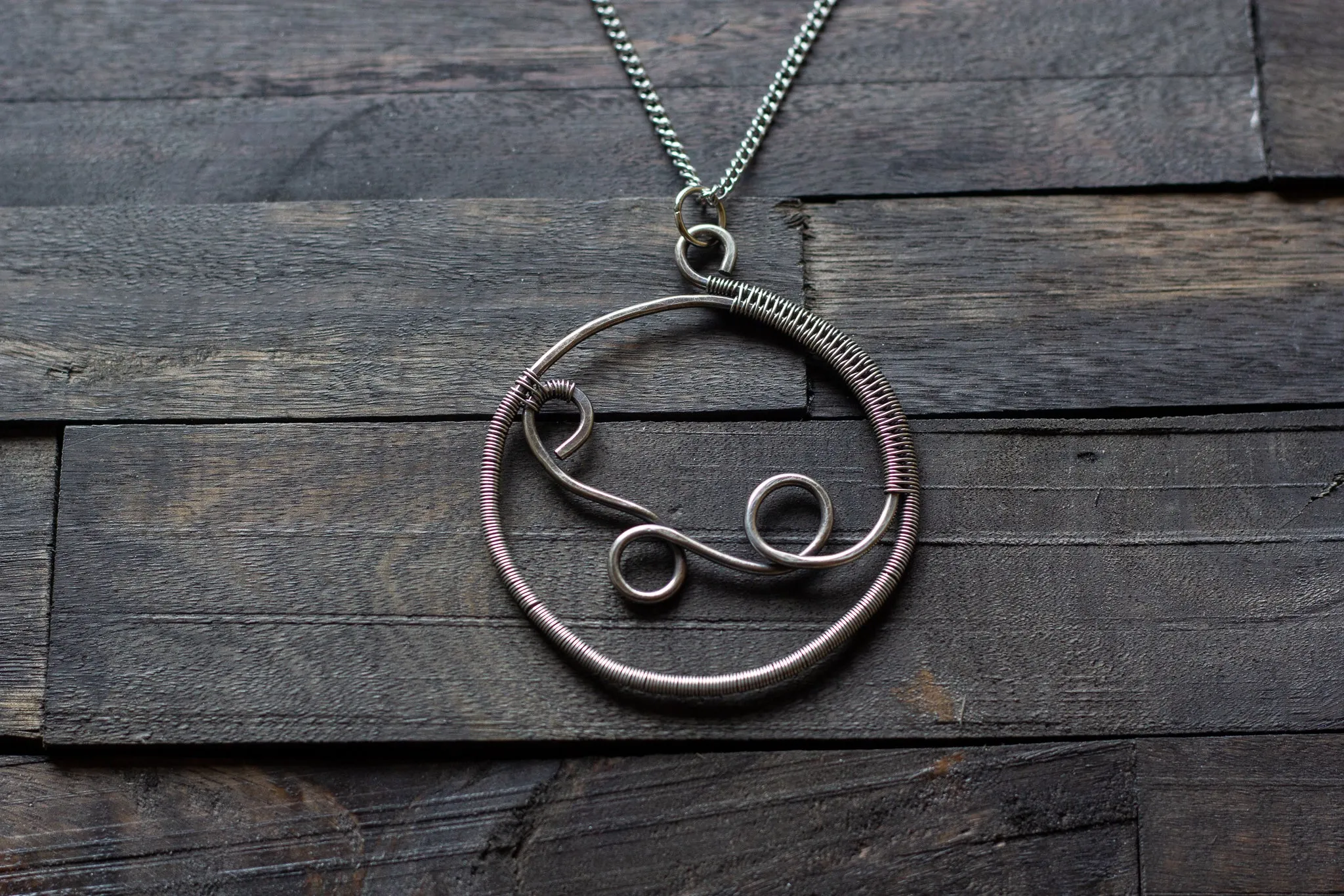 Circular Sterling Silver Wire Wrapped Pendant