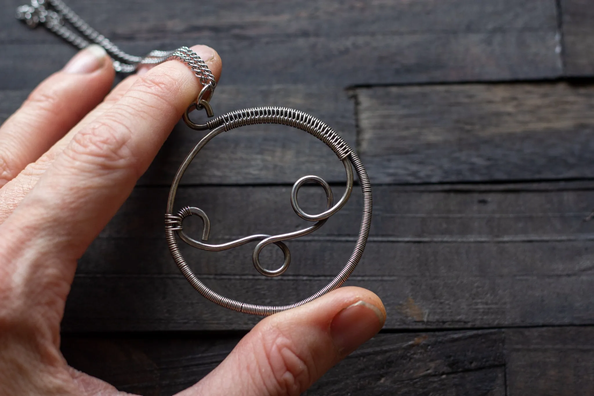 Circular Sterling Silver Wire Wrapped Pendant