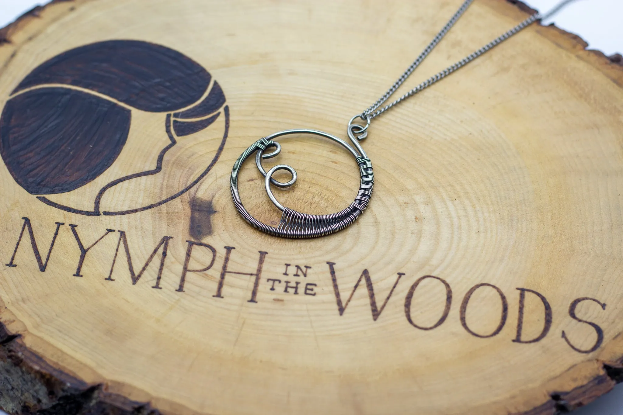 Circular Sterling Silver Wire Wrapped Pendant
