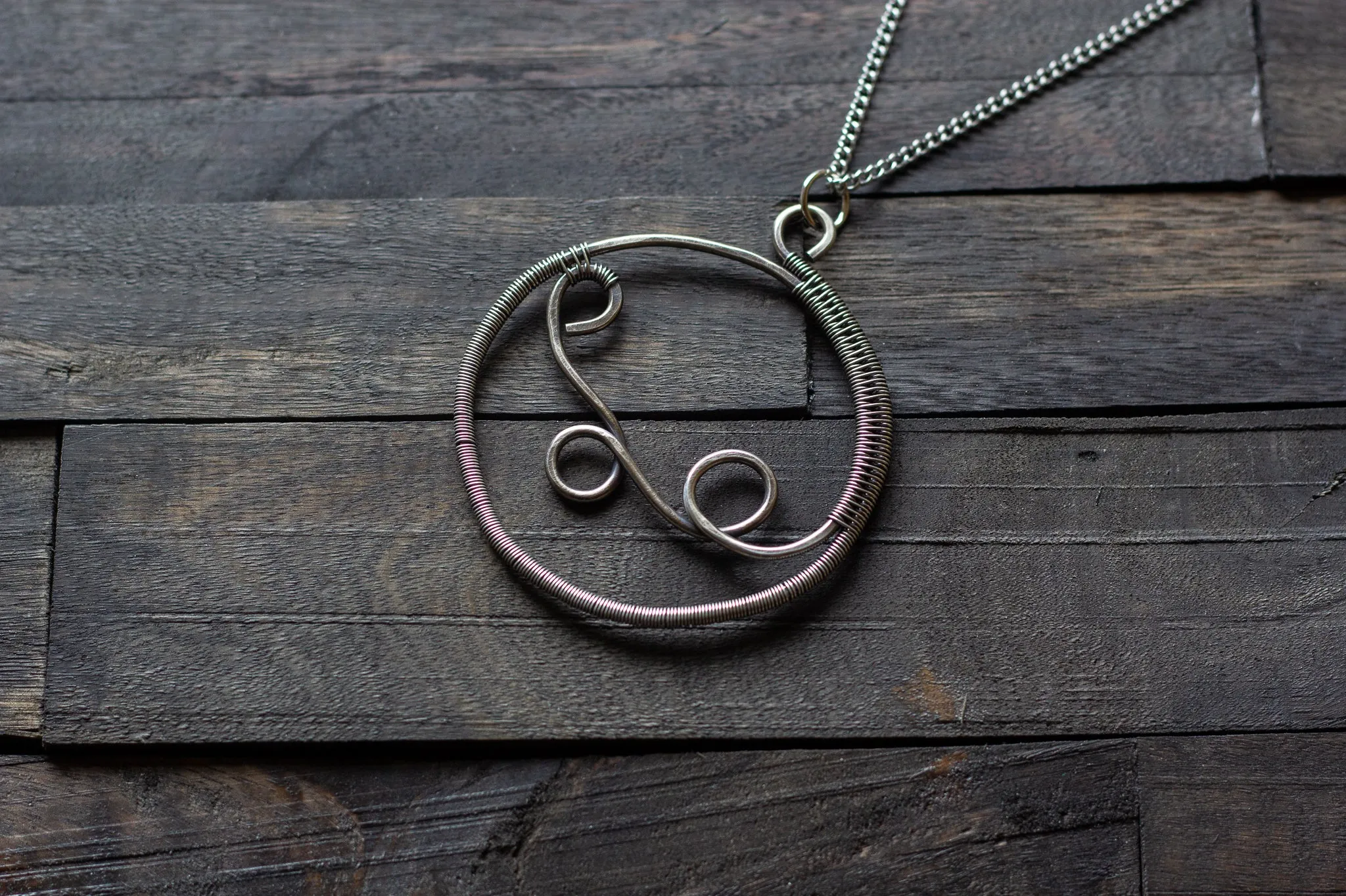 Circular Sterling Silver Wire Wrapped Pendant