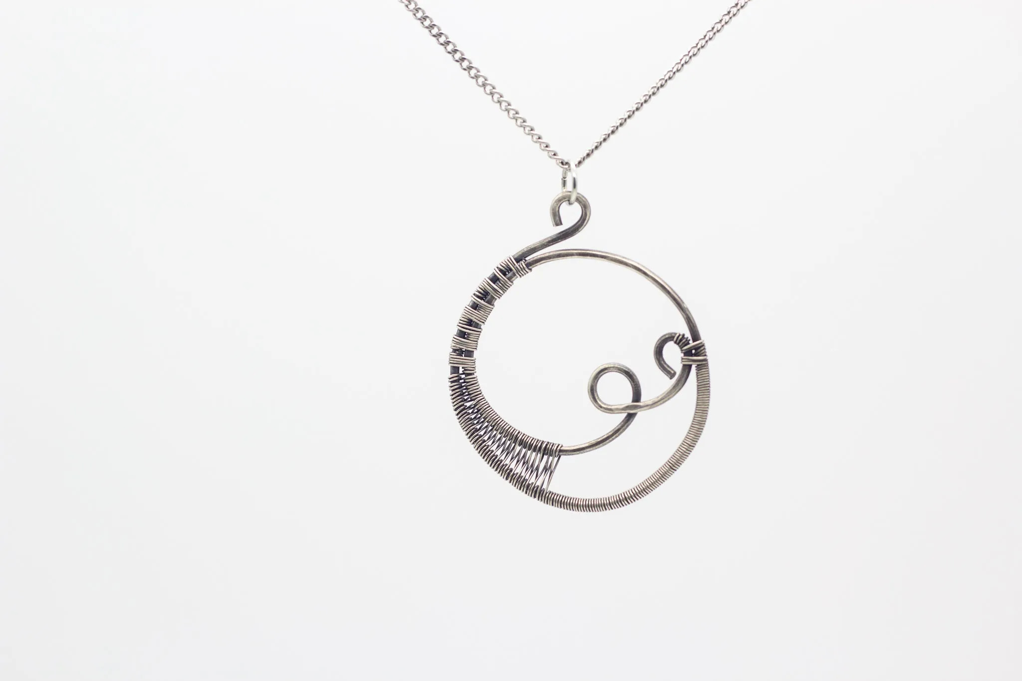 Circular Sterling Silver Wire Wrapped Pendant