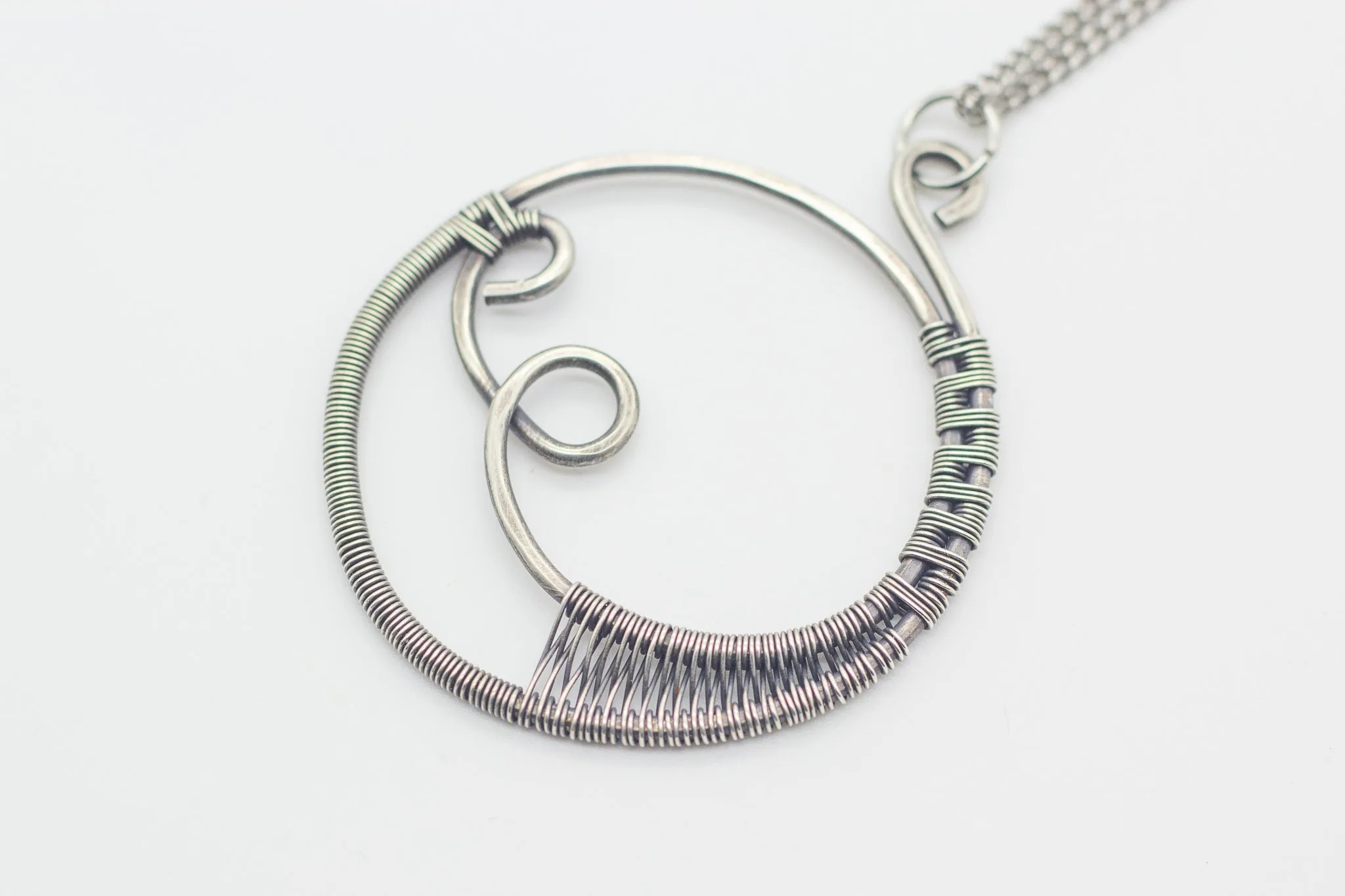 Circular Sterling Silver Wire Wrapped Pendant