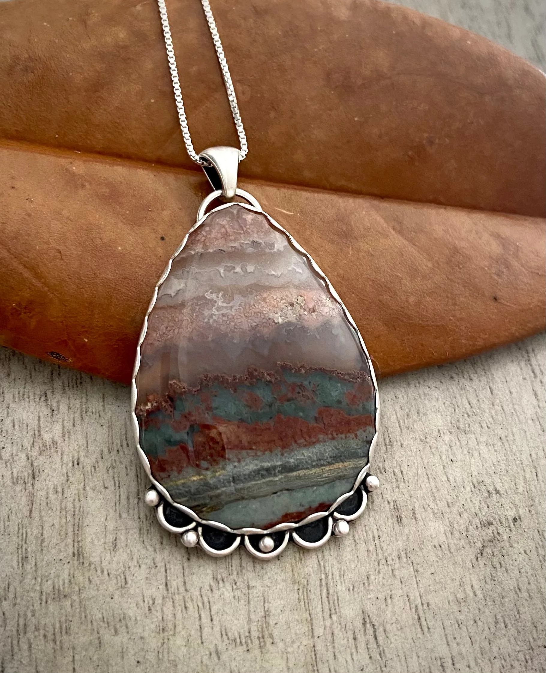 Prudent Man Plume Agate Pendant