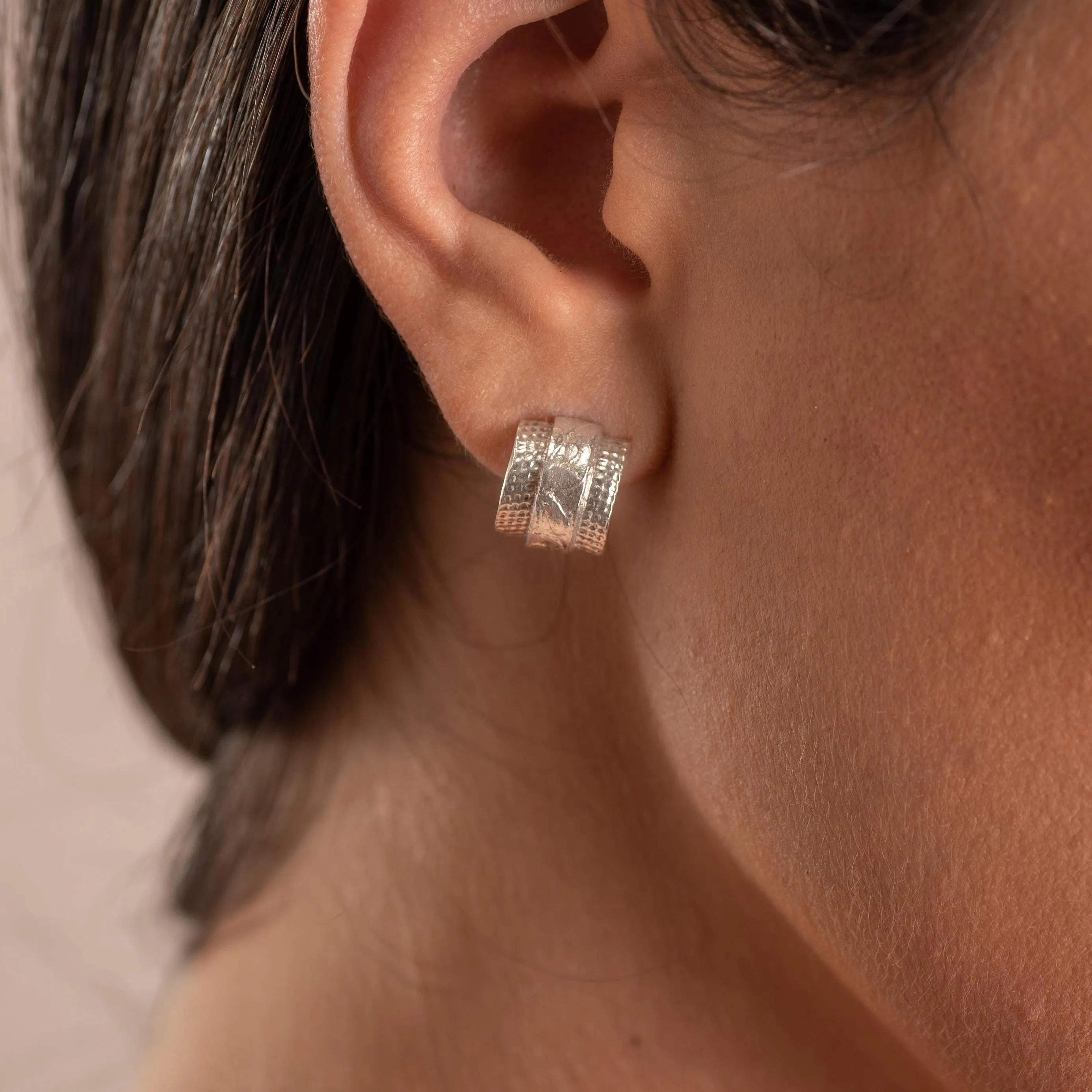 Silver Toned Half Hoop Textured Earrings