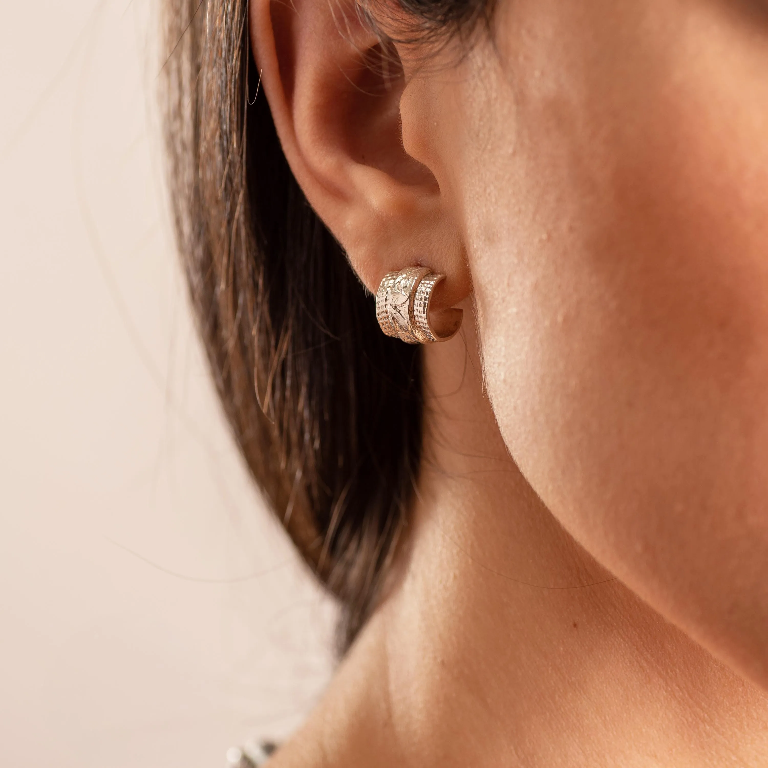 Silver Toned Half Hoop Textured Earrings