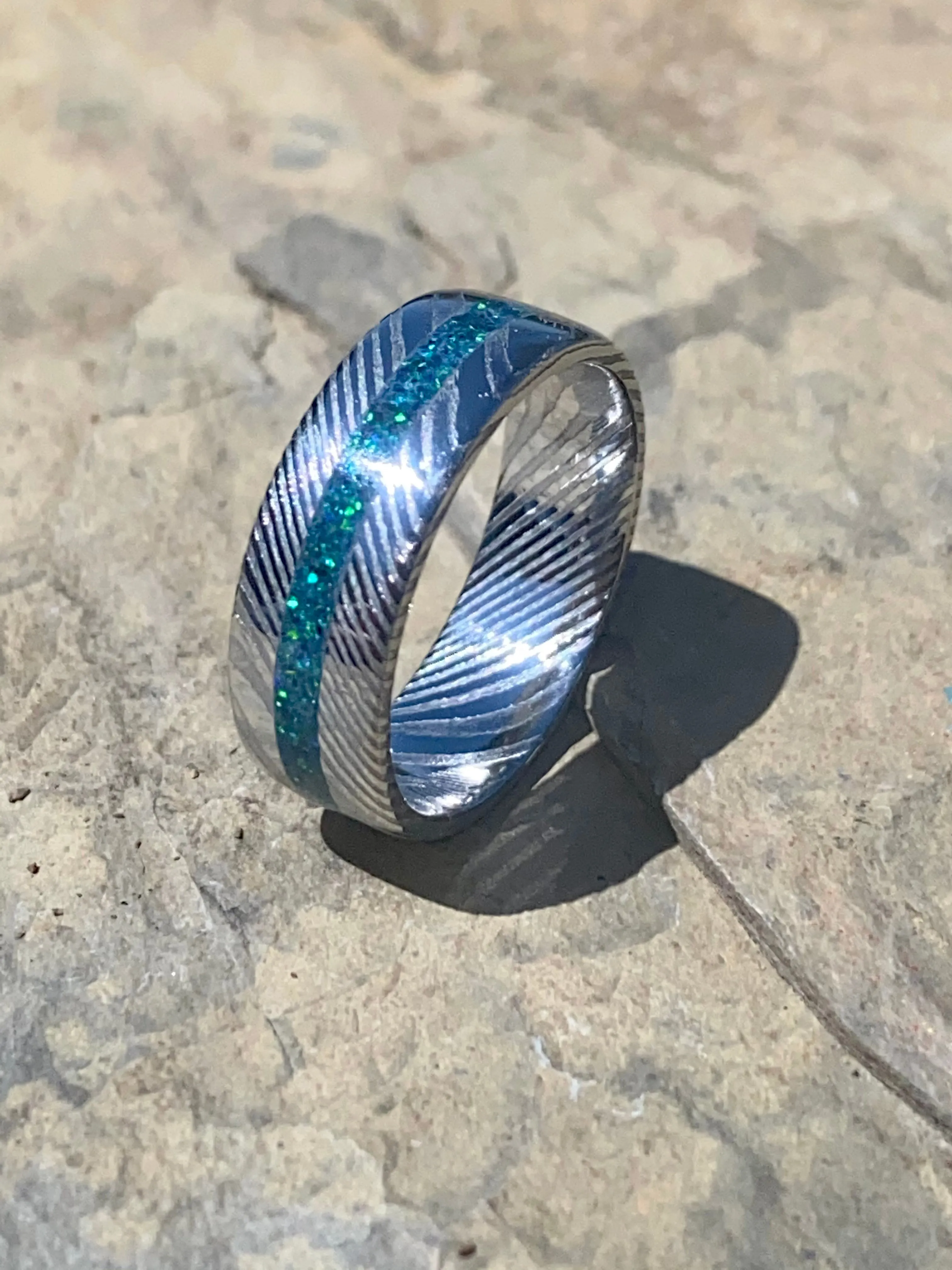Stainless steel Damascus with emerald opal