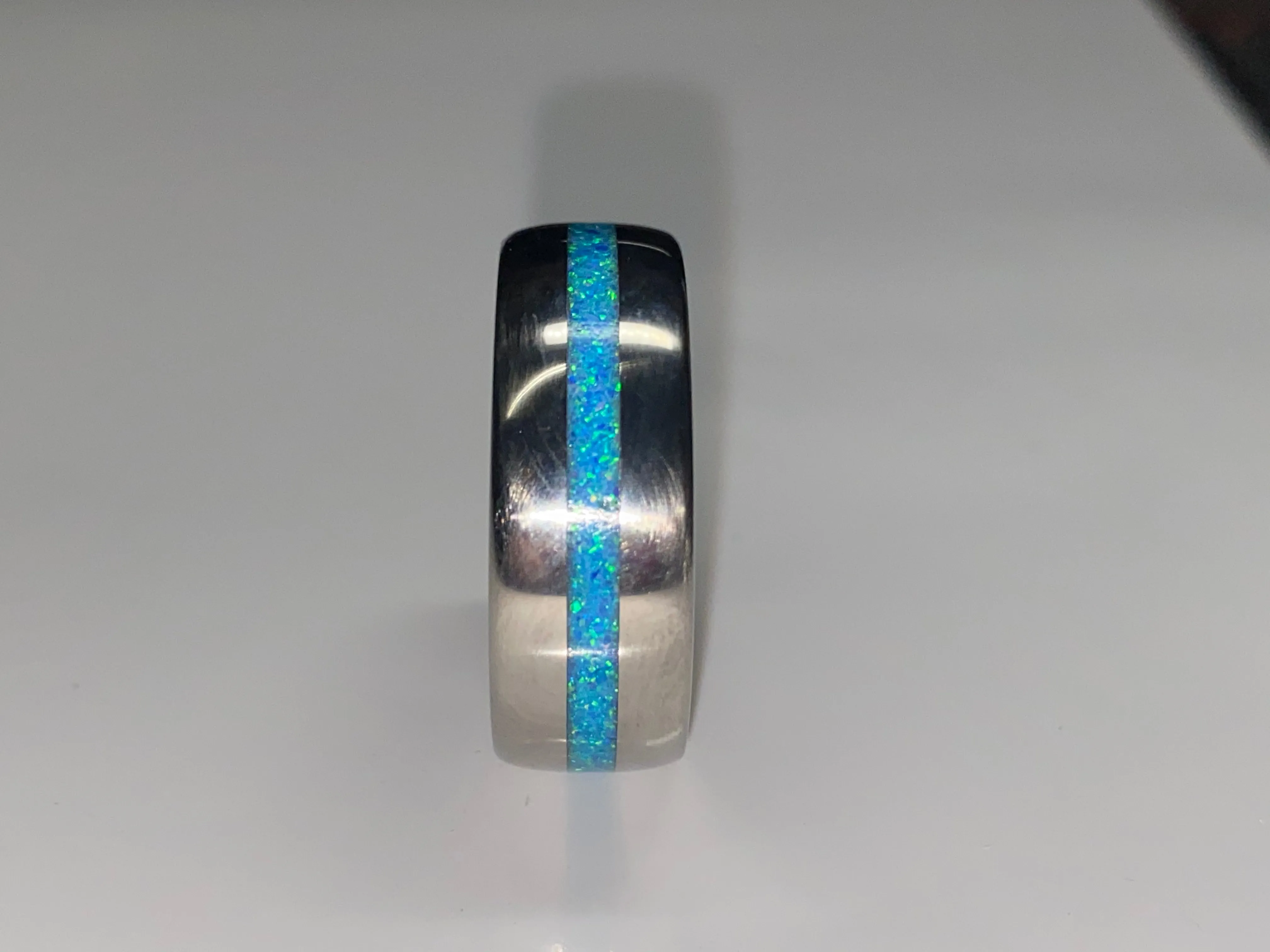 Titanium with blue opal inlay
