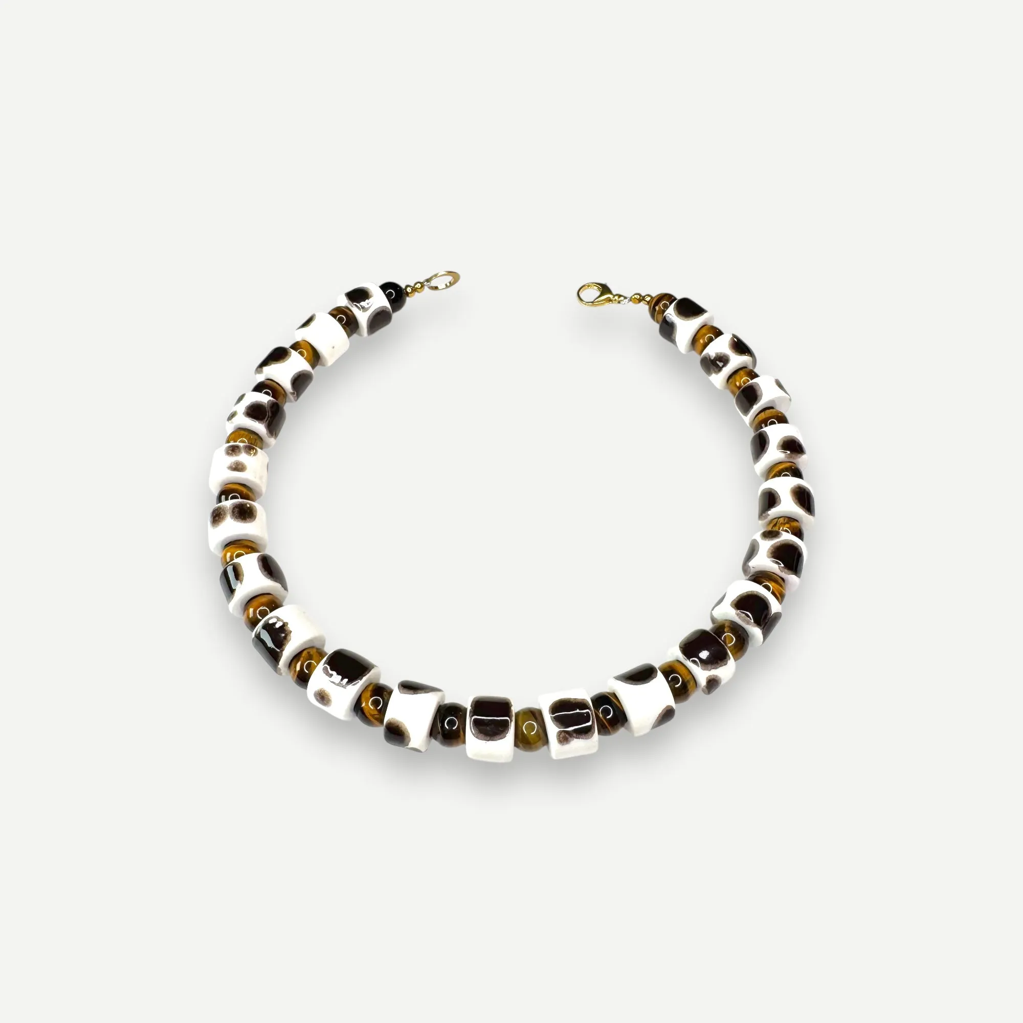 TORT & CAT EYE SUNDRY.  BEAD TWO.