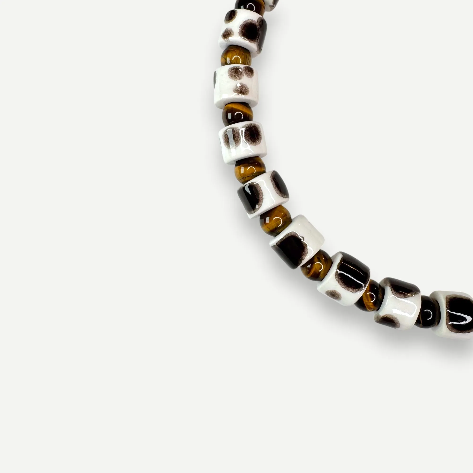 TORT & CAT EYE SUNDRY.  BEAD TWO.