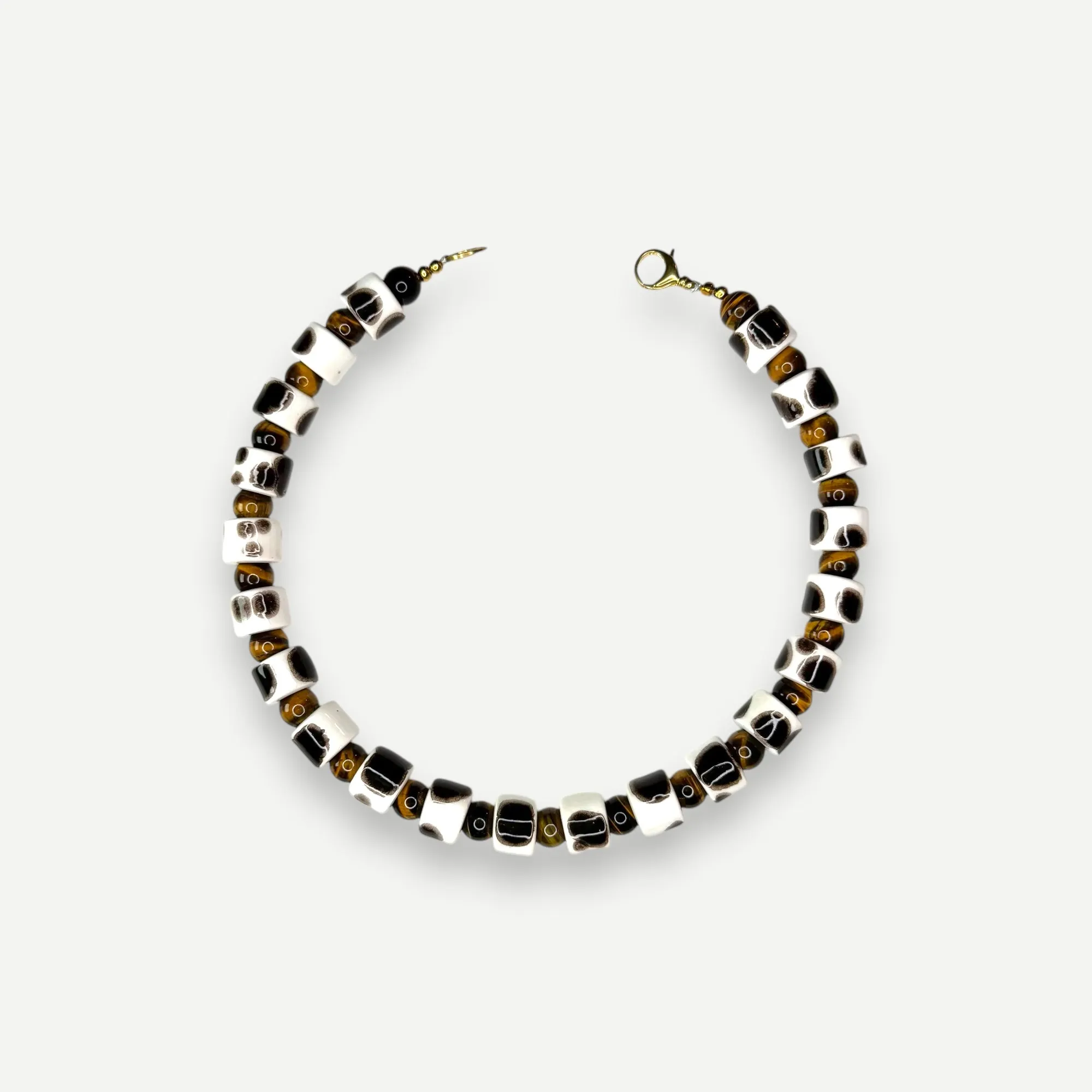 TORT & CAT EYE SUNDRY.  BEAD TWO.